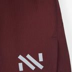 NNormal Race Short Burgundy - pormenor do logótipo refletor