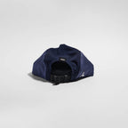 GORRA DE CARRERAS CON PLUMA VÅGA - NARANJA NEÓN / CIRUELA