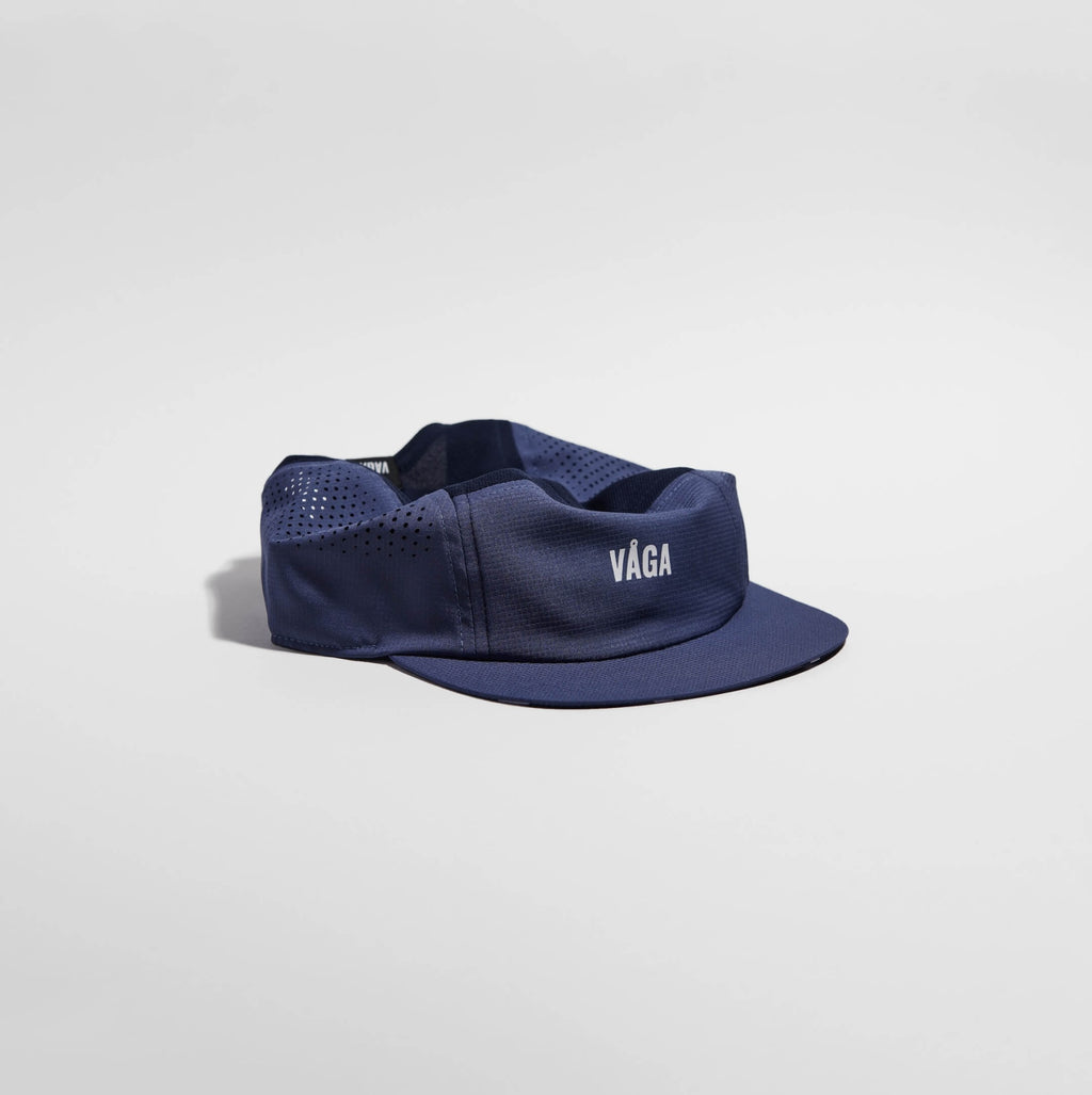 GORRA DE CARRERAS CON PLUMA VÅGA - NARANJA NEÓN / CIRUELA