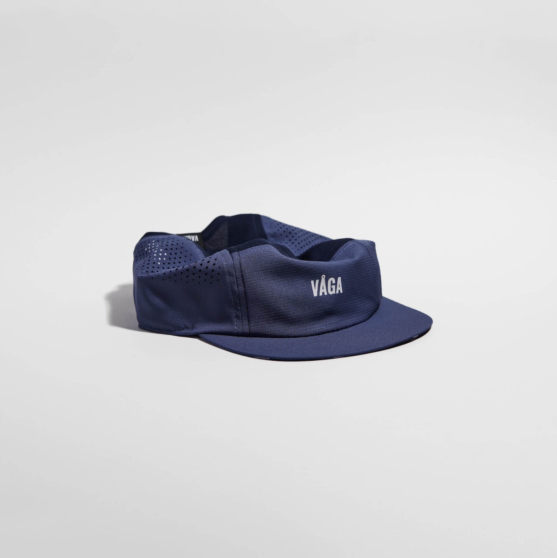 GORRA DE CARRERAS CON PLUMA VÅGA - NARANJA NEÓN / CIRUELA