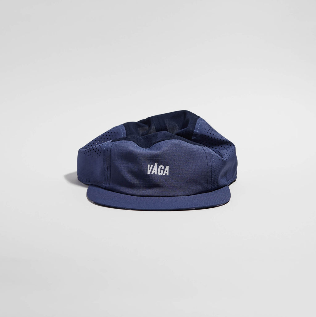 GORRA DE CARRERAS CON PLUMA VÅGA - NARANJA NEÓN / CIRUELA