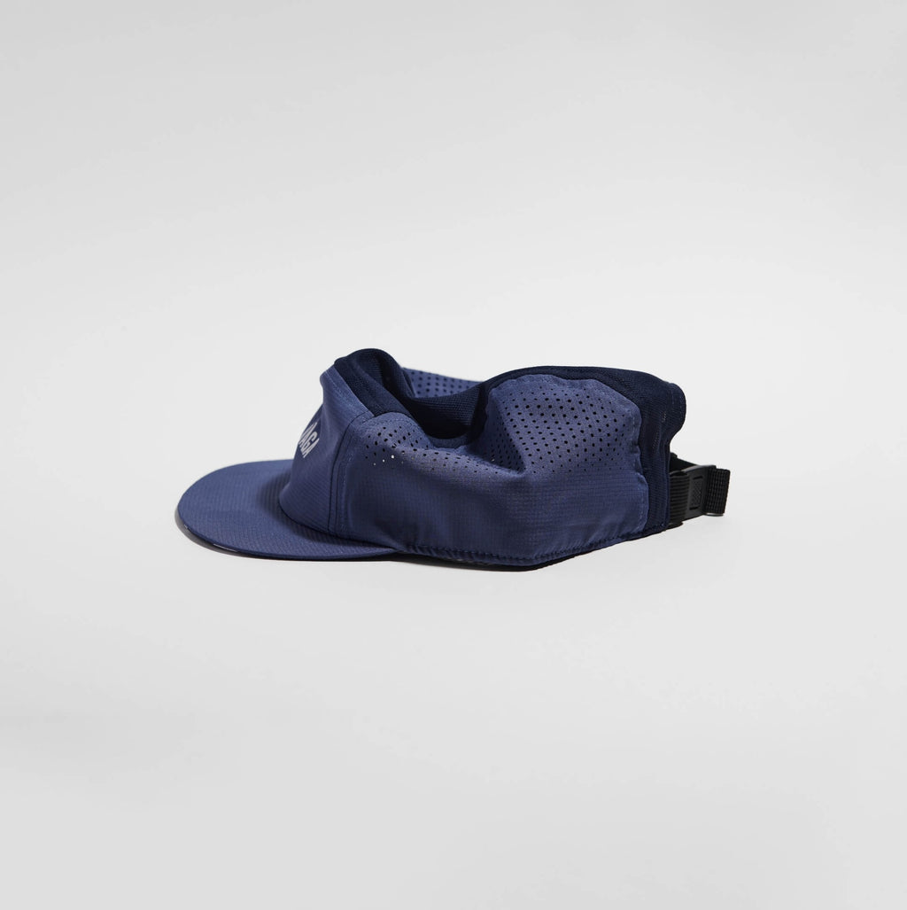 GORRA DE CARRERAS CON PLUMA VÅGA - NARANJA NEÓN / CIRUELA