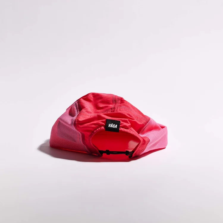 GORRA DE CARRERAS CON PLUMA VÅGA - NARANJA NEÓN / CIRUELA