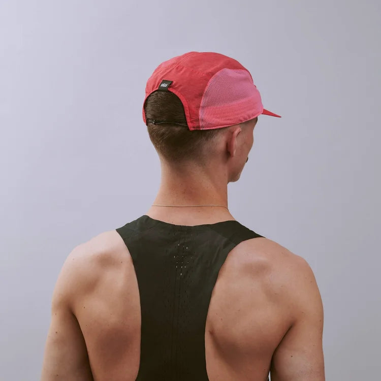GORRA DE CARRERAS CON PLUMA VÅGA - NARANJA NEÓN / CIRUELA