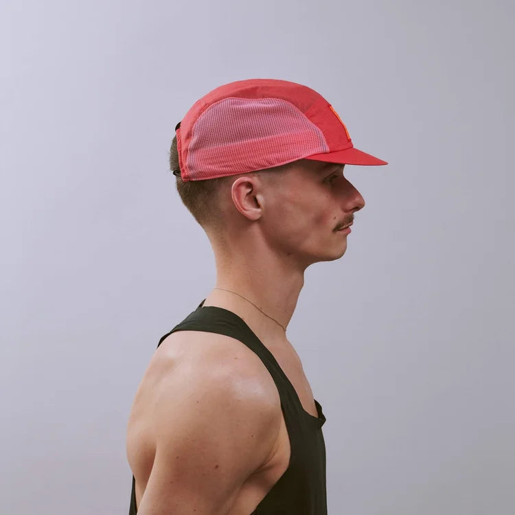 GORRA DE CARRERAS CON PLUMA VÅGA - NARANJA NEÓN / CIRUELA