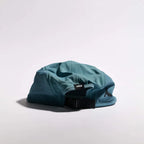 GORRA DE CARRERAS CON PLUMA VÅGA - NARANJA NEÓN / CIRUELA